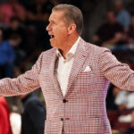 John Calipari reacts with disappointment as his Arkansas squad stumbles against South Carolina.