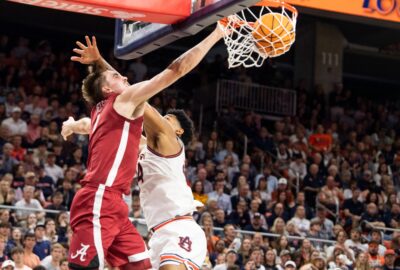 Grant Nelson dunks on an Auburn player.