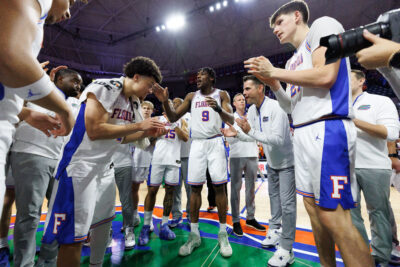Florida players gather after win over Ole Miss.