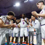 Florida players gather after win over Ole Miss.