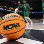 A college basketball is shown.