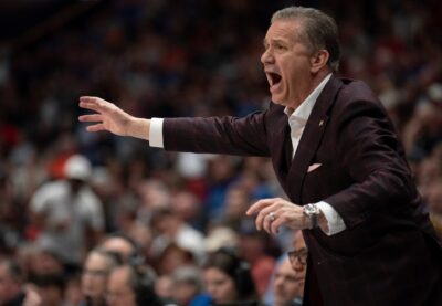 John Calipari is shown.