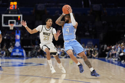 RJ Davis plays against Wake Forest in the ACC Tournament.
