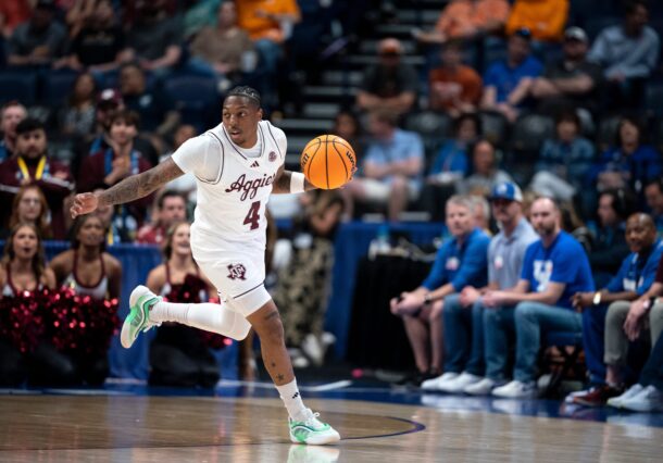 Wade Taylor dribbles the ball in the SEC Tournament.