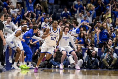 Otega Oweh celebrates after a made shot against Oklahoma.
