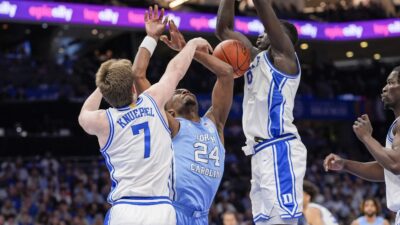 Duke and UNCA players in action.