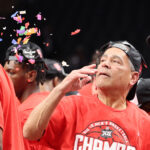Kelvin Sampson celebrates another Big 12 Tournament title.