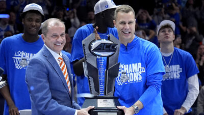 Duke head coach Jon Scheyer celebrates the ACC Tournament.