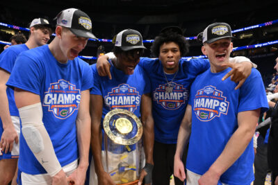 Florida players shown after winning SEC Tournament championship.