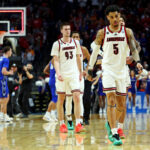 Louisville basketball is shown.