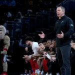 Georgia coach Mike White is shown.