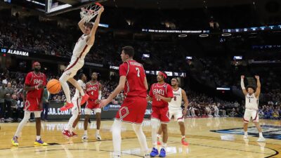 Grant Nelson dunks the ball against Robert Morris in the 2025 NCAA Tournament.