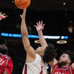 Mark Sears fights for a rebound against Robert Morris.