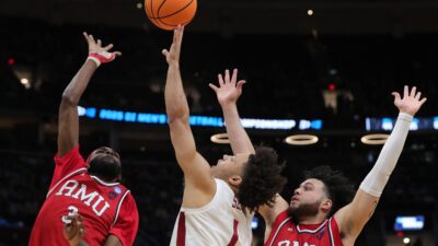 Mark Sears fights for a rebound against Robert Morris.