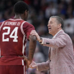 John Calipari is shown.