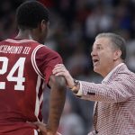 John Calipari is shown.