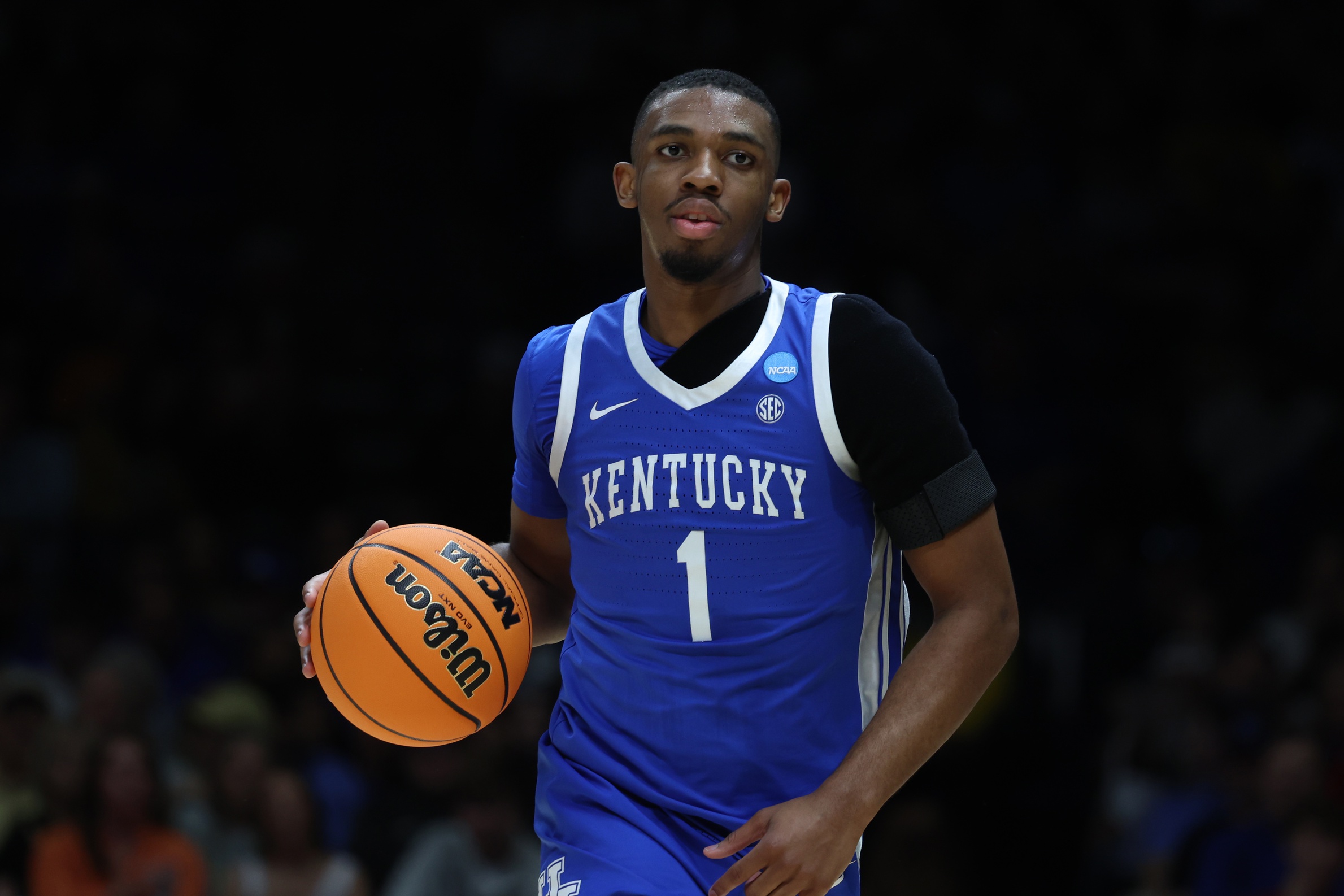 Lamont Butler, Mark Pope share moment after Sweet 16 loss