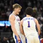 Florida stars Thomas Haugh and Walter Clayton Jr. celebrate.