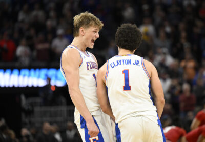 Florida stars Thomas Haugh and Walter Clayton Jr. celebrate.