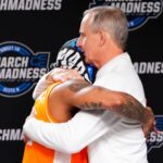 Zakai Zeigler and Rick Barnes embrace.