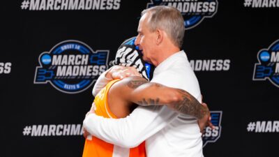 Zakai Zeigler and Rick Barnes embrace.