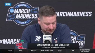 Ole Miss coach Chris Beard at a press conference.