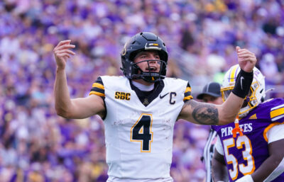 Joey Aguilar reacts after throwing a touchdown pass.