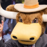 Lee Corso in Texas's headgear.