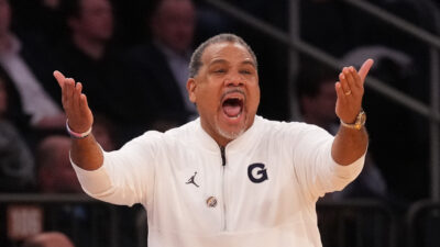 Ed Cooley coaches during a Georgetown game.