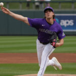 Chase Dollander throws a pitch.