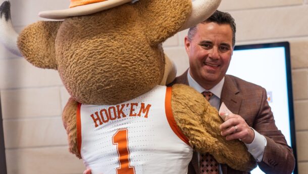 New Texas head coach Sean Miller with mascot.