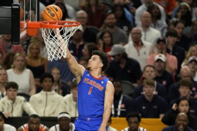 Walter Clayton Jr. lays the ball into the basket against Auburn.
