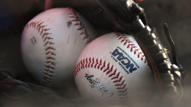 Baseballs in a glove.