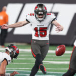 Rodrigo Blankenship kicks a field goal.