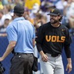 Tennessee baseball coach Tony Vitello talks with an umpire at the SEC Tournament.
