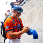 Florida star Colby Shelton signs an autograph.