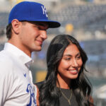 Jac Caglianone poses with his sister after signing his contract.