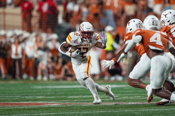 Ahmad Hardy runs the ball.