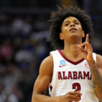 Aden Holloway is shown.