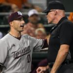 Texas A&M heads coach Michael Earley discusses a call.