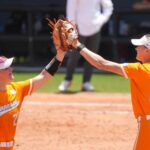 Tennessee softball players celebrate an out.