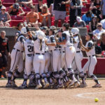 Arkansas softball celebrates a walk-off win.