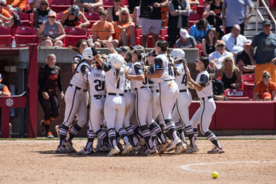 Arkansas softball celebrates a walk-off win.