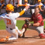 Tennessee and Alabama players collide at the SEC Tournament.