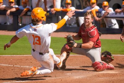 Tennessee and Alabama players collide at the SEC Tournament.