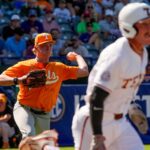 Tennessee pitcher Liam Doyle throws out a Texas runner.