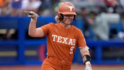 Joley Mitchell shown playing for Texas in Women's College World Series.