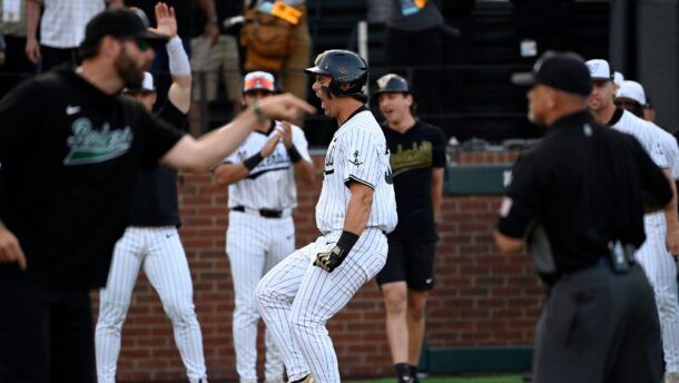 Wright State coach Alex Sogard argues as Vanderbilt's Riley Nelson celebrates.