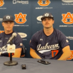 Auburn players shown speaking to media postgame.