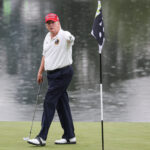 Donald Trump golfing.